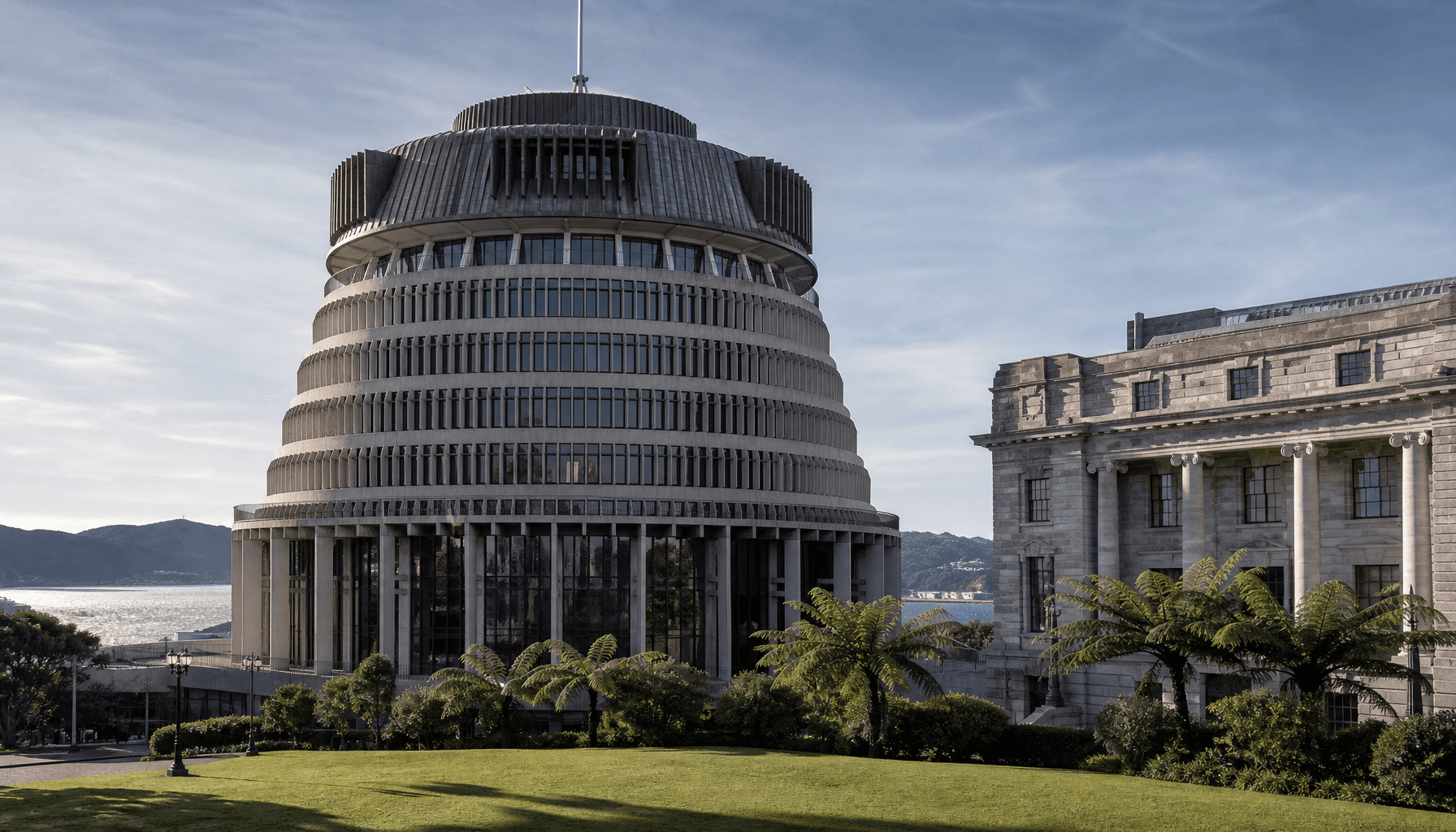 Exterior view of the Beehive executive wing of New Zealand Parliament in Wellington under winter daylight.