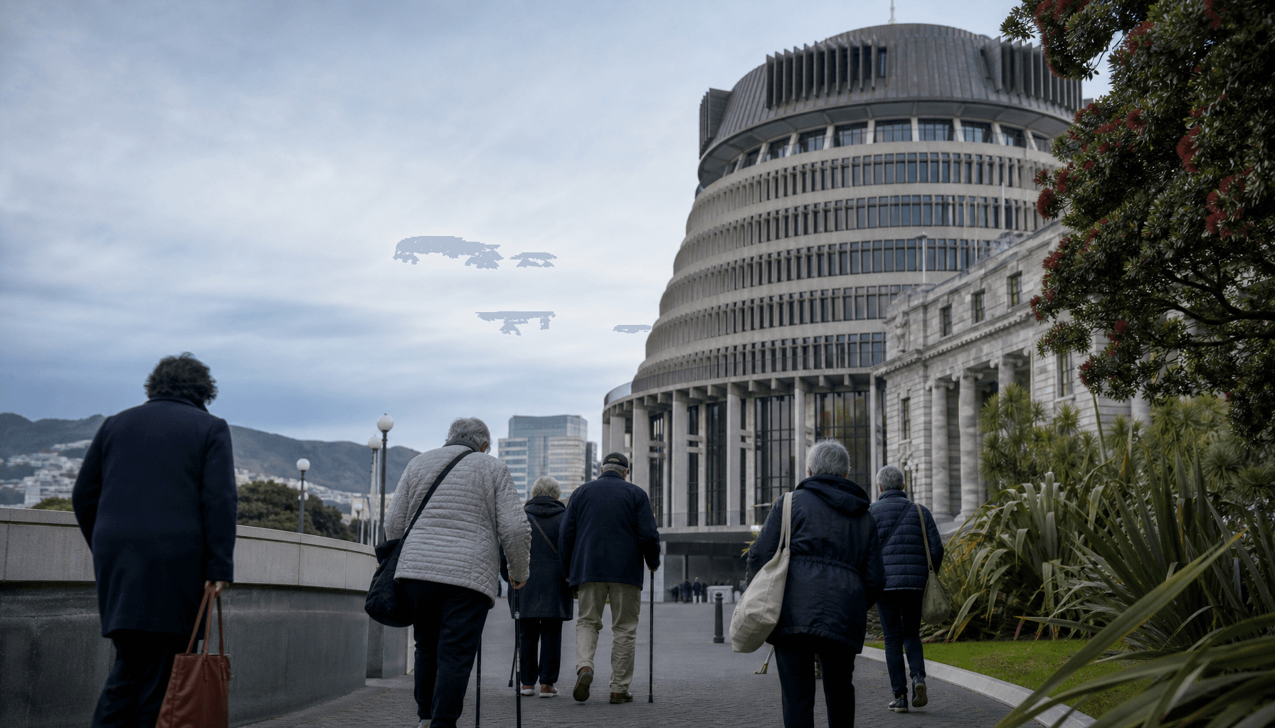 Beehive exterior in Wellington with unidentified older pedestrians on the footpath below